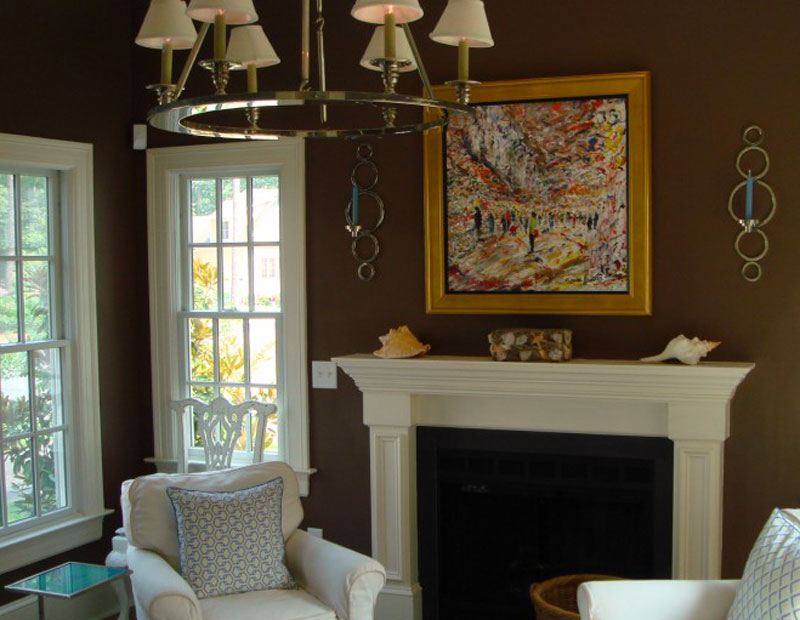 Quiet Study Area - This quaint sitting area is perfect for relaxing with a good book lit by custom light fixtures and a crackling fire under the unique mantle.