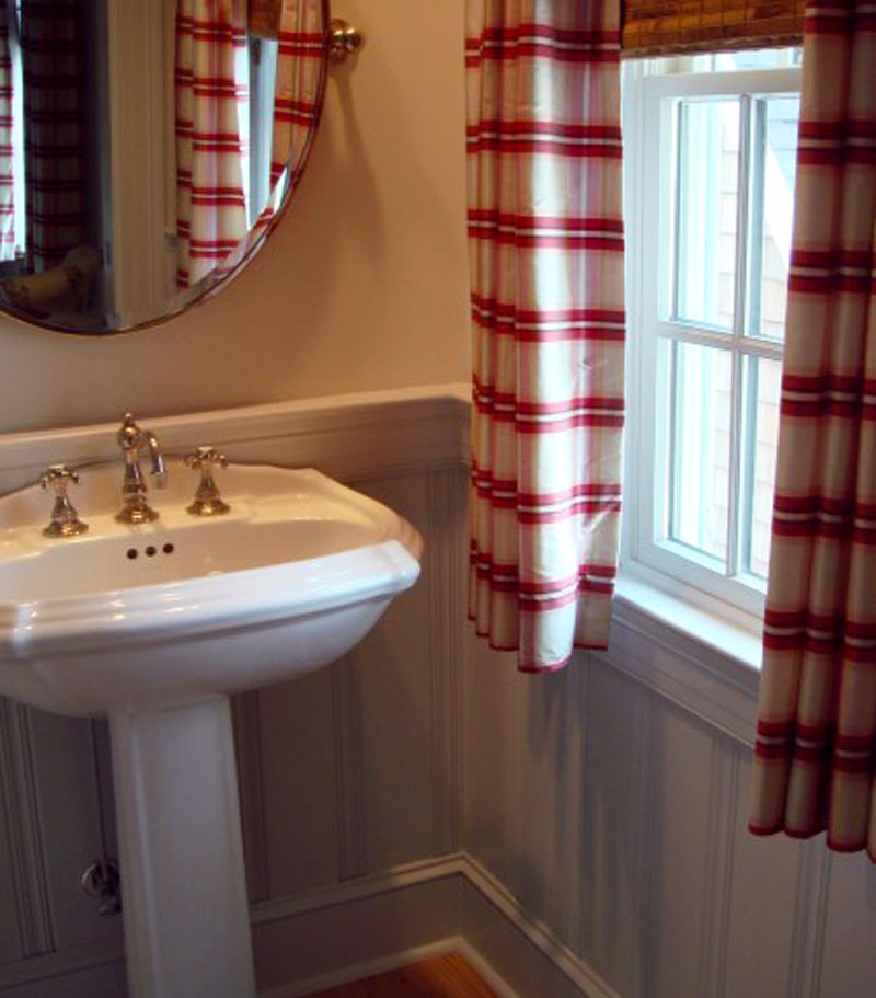 Bathroom - Custom baseboards, breadboard, cap molding, and plumbing fixtures define this stylish space.